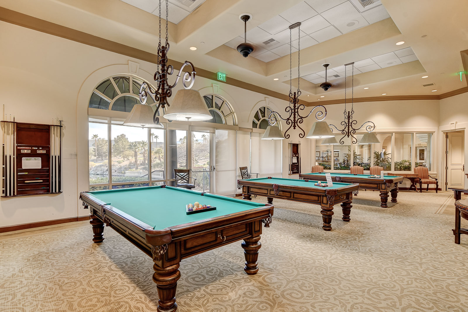 Billiards room with three pool tables at the Siena Community Center