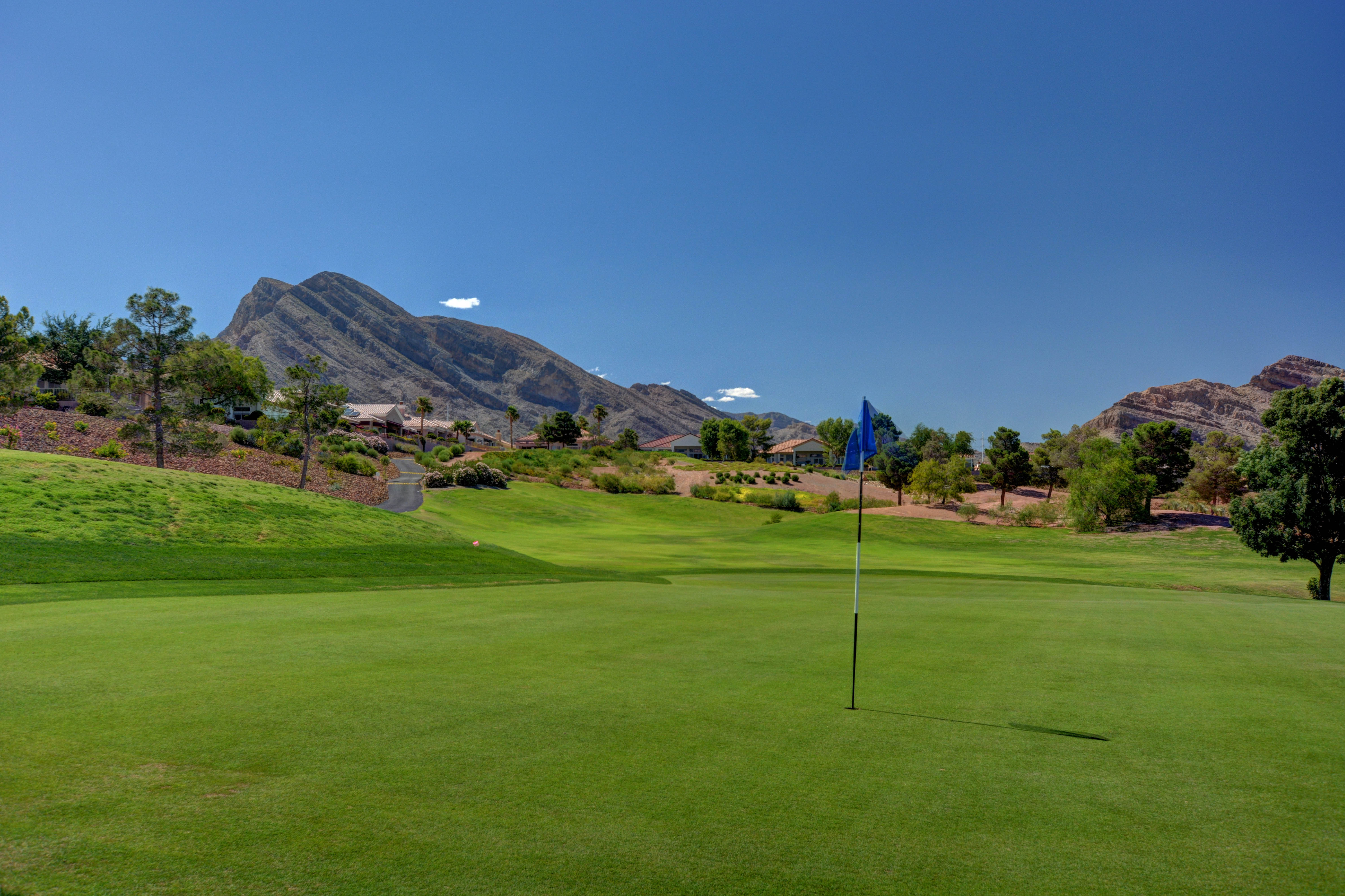 Golf course green with flag at Sun City Summerlin in Las Vegas, Nevada
